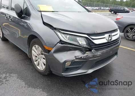2018 Honda Odyssey Lx z USA, uszkodzony, nr VIN 5FNRL6H21JB034782